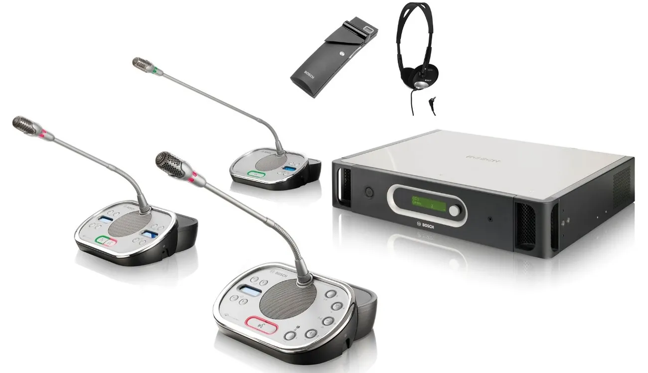 A Bosch discussion system with delegate microphones, a central unit, and a receiver with headphones