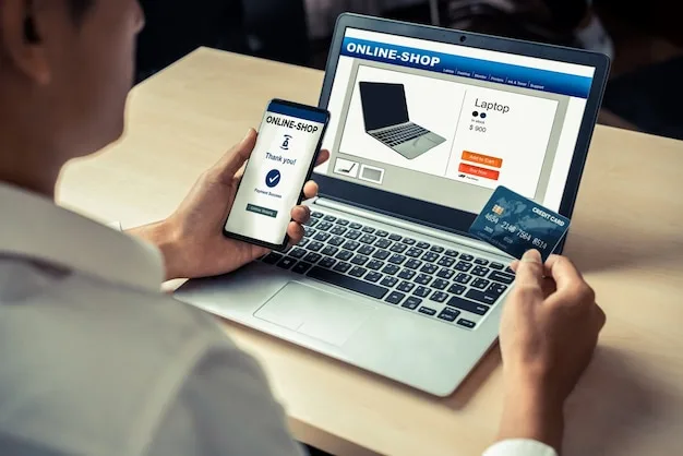 A shopper paying by card on a laptop with a confirmation on their phone