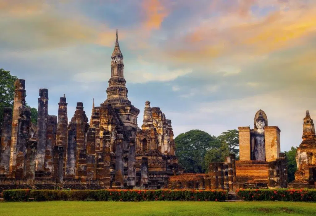Temple ruins at Sukhothai Historical Park, Thailand, at sunset